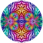 This lively mandala features ribbons of metallic rainbow hues, with strong bilateral symmetry.