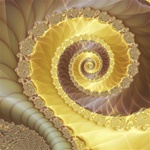 This abstract fractal image features a strong central spiral and is evocative of ribbons of white and milk chocolate.